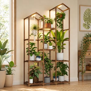 May include: A tall, multi-tiered brown wooden plant stand with a house-shaped frame, featuring integrated LED grow lights at the top. The stand holds various potted green plants of different sizes and shapes on multiple shelves.