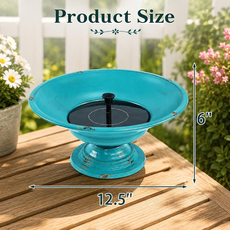 May include: A turquoise pedestal bird bath with a distressed finish and a central black solar panel. The bowl measures 12.5 inches in diameter and the total height of the unit is 6 inches, as indicated by the text and arrows in the image.