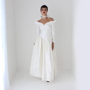 1980s Ivory Raw Silk Dupion Basque Waist, Off Shoulder, Long Sleeve Wedding Gown w/ Bow & Full Voluminous Skirt