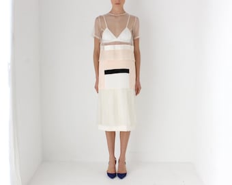 Vestido de cóctel Karla Spetic 2014 de seda y malla con diseño geométrico abstracto.