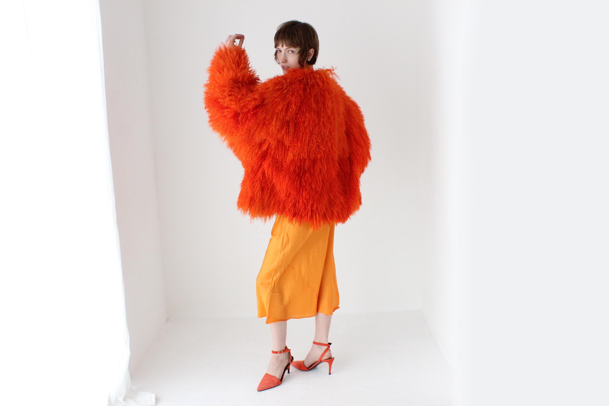 RESERVED - Wild 1970s Genuine Mongolian Lambswool Orange Shag Coat
