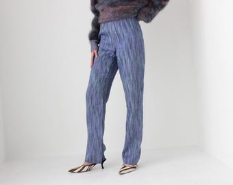 Interesantes pantalones de corte bota con textura de punto tejido estilo Y2K