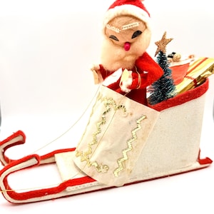Figura navideña vintage de los años 50 y 60 de Papá Noel en trineo de Putz, fabricada en Japón.
