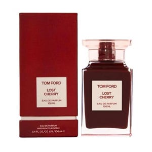 May include: A bottle of Tom Ford "Lost Cherry" Eau de Parfum, 3.4 fl oz. The perfume bottle is a dark red color with a clear cap. The box is a matching dark red with white text.