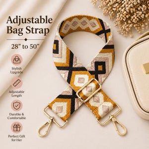 May include: An adjustable bag strap with a geometric pattern in black, gold, and cream. The strap is 28 to 50 inches long and features gold-colored metal hardware. The text "Adjustable Bag Strap" is visible in the image.