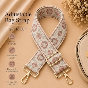 May include: An adjustable bag strap with a floral pattern in cream, pink, and green. The strap is 28 to 50 inches long and features gold-colored metal hardware. The text "Adjustable Bag Strap" is visible in the image.