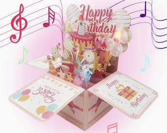 Cartão de aniversário musical 3D em caixa pop-up com luzes, cartão rosa de feliz aniversário com números da idade, cartão de presente com som de vela soprando.