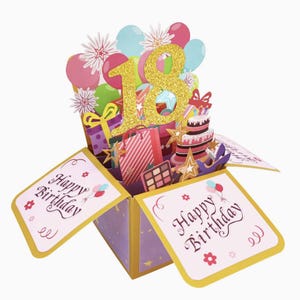May include: A pop-up birthday card with a gold glitter "18" in the center. The card features a cake, gifts, balloons, and the words "Happy Birthday". The card is purple with gold trim.