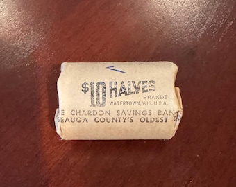 Rollo de 20 monedas de medio dólar Kennedy con un 40% de plata, procedentes de 1965-1969.