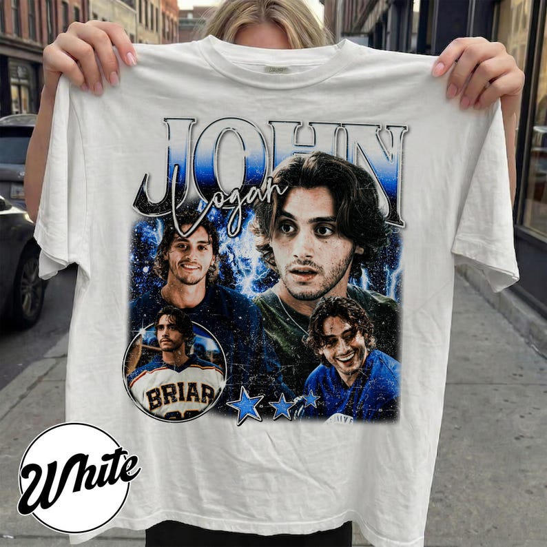 May include: White t-shirt featuring a graphic design with the name "John Logan" in a vintage style. The design includes multiple images of a person, along with the word "Briar" and blue stars.