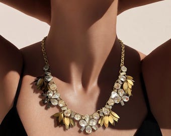 Collar llamativo de J Crew con pulsera rígida a juego de J. Crew.