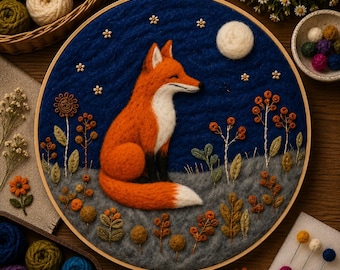 May include: A handcrafted embroidery hoop art piece featuring a fox. The fox is orange and white, set against a blue night sky with a full moon and stars. The scene includes detailed floral and plant elements, all within a wooden hoop.