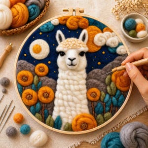 May include: A fiber art piece featuring a white llama with a cream-colored head, set against a dark blue night sky with orange and yellow accents. The scene includes orange flowers and blue foliage, all within a wooden embroidery hoop.