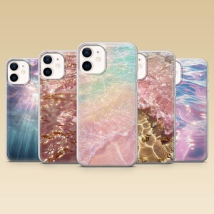 May include: Five smartphone cases arranged in a row, each featuring a unique water-themed design. The patterns include blue light rays, shimmering copper ripples, soft pink and teal ocean waves, golden sandy water, and purple-tinted water reflections.