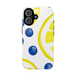 May include: White phone case with a repeating pattern of blue circles and yellow lemon slices. The case has a dual-lens camera cutout and black side buttons. The design is bright and cheerful.