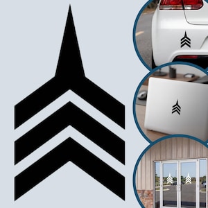 May include: A black vinyl decal featuring a sharp, upward-pointing arrow design composed of three stacked chevron stripes topped with a single vertical spike. The graphic is displayed on a white car bumper, a silver laptop, and glass doors.