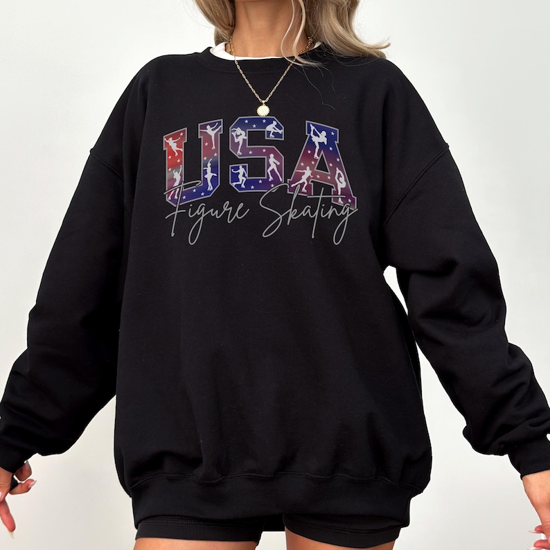 Black USA Figure Skating sweatshirt with bold patriotic skating graphic, cozy crewneck for skating fans, ice skating mom gift, winter sports apparel.