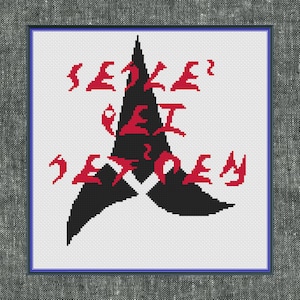 May include: Cross-stitch artwork with a black and red design on a white background, framed in a blue-lined grey frame. The design includes a black shape with red text that reads "SEIZE THE DAY".