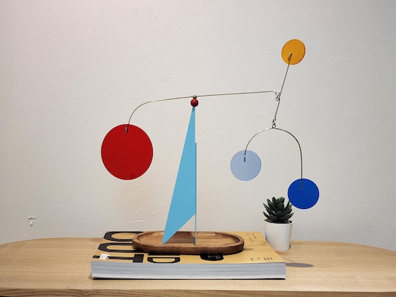 Handmade Calder-inspired hanging mobile with real balance engineering — 27 favorites signal this is a maker who knows what they're doing.
