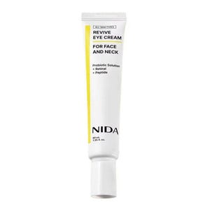 May include: A white tube of NIDA Revive Eye Cream for Face and Neck. The tube has a yellow stripe and black text that reads "ALL SKIN TYPES", "REVIVE EYE CREAM", "FOR FACE AND NECK", and "40 ml / 1.35 fl. oz."