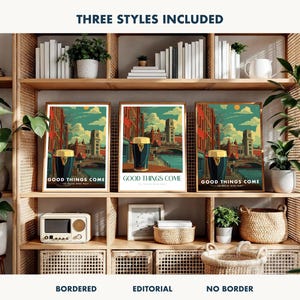May include: Three framed art prints with the text "GOOD THINGS COME" and a stylized image of a pint of stout. The prints are displayed on a wooden shelf with other decorative items, including plants, books, and a vintage radio. The prints are available in bordered, editorial, and no border styles.