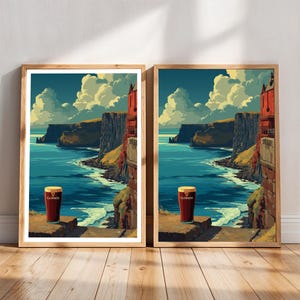 May include: Two framed art prints featuring a pint of Guinness stout set against a scenic coastal landscape with cliffs, ocean, and sky. The artwork has a vintage, illustrative style with a warm color palette.