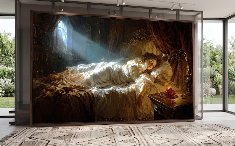 Puede incluir: Un gran cuadro rectangular de pared que muestra a una persona acostada en una cama en una habitaci&oacute;n con poca luz. Un rayo de luz ilumina a la persona, que viste una prenda blanca. Una rosa roja descansa sobre una mesita de noche de madera oscura.