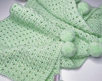 Manta de bebé tejida a crochet con forma de bola de hojaldre