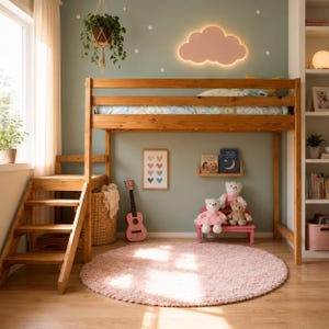 May include: A wooden loft bed with a built-in staircase, a pink rug, and a pink guitar. The room is decorated with a cloud-shaped light fixture, a framed heart art print, and teddy bears on a pink bench. A woven basket is near the stairs.
