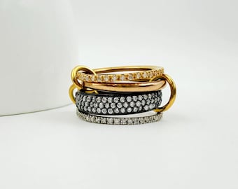 Conjunto de anillos de diamantes de oro de 14 quilates con múltiples eslabones: bandas entrelazadas de plata de ley.