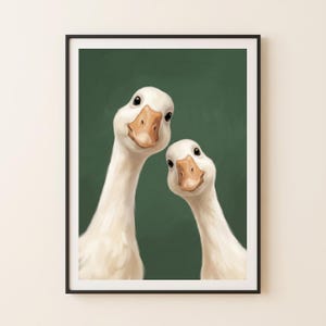 May include: A framed digital illustration featuring two white geese with orange beaks positioned against a solid dark green background. The geese are shown from the chest up, with their long necks angled towards each other in a vertical orientation.
