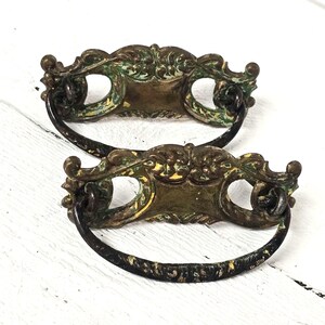 Pair Antique Stamped Brass Drawer Pulls with Old Green and Cream Paint