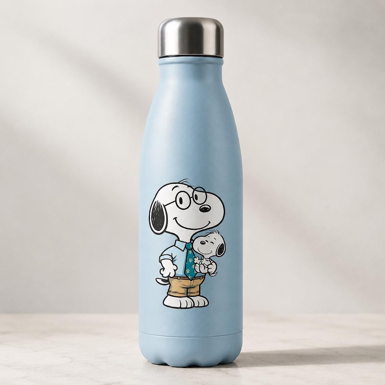 May include: A light blue reusable water bottle with a metallic silver cap. The front features a graphic of a white cartoon dog wearing round glasses, a light blue shirt with a patterned tie, and tan trousers, while holding a smaller white puppy.