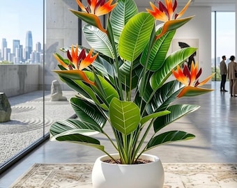 Planta artificial de ave del paraíso con pinzones rojos al atardecer – Decoración de oasis tropical