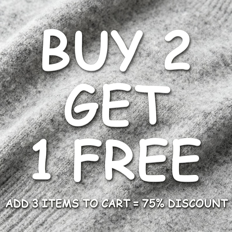 May include: White text on a grey fabric background reads "BUY 2 GET 1 FREE". Beneath, smaller text states "ADD 3 ITEMS TO CART = 75% DISCOUNT". The fabric has a textured appearance.