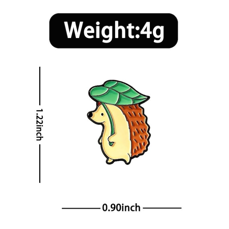 May include: A whimsical hedgehog pin, 3.1 cm tall and 2.3 cm wide, with a green leaf hat. The pin is cream, brown, and green, and weighs 4g. The text "Weight: 4g" is in a black rectangle.