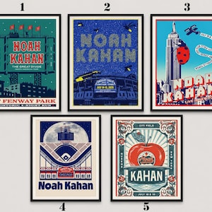 May include: Five rectangular concert posters for Noah Kahan. Poster 1 shows a Fenway Park billboard. Poster 2 features Wrigley Field with fireflies. Poster 3 depicts the Empire State Building with a ladybug. Poster 4 shows a baseball field under a moon. Poster 5 features a large red apple.