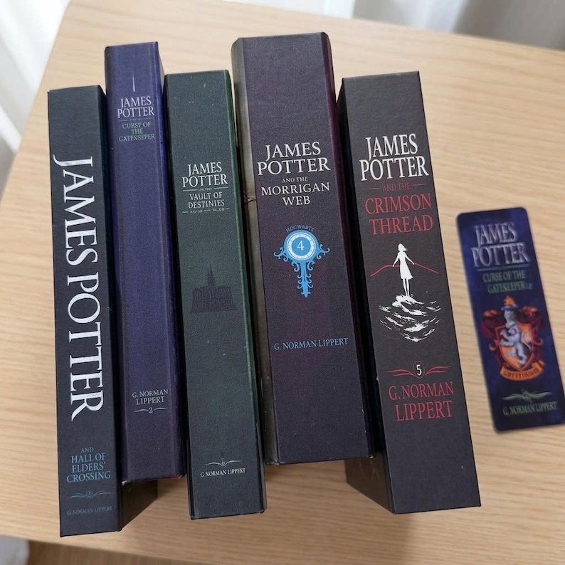 May include: A collection of five James Potter books by G. Norman Lippert, including titles like Hall of Elders Crossing, Curse of the Gatekeeper, Vault of Destinies, The Morrigan Web, and The Crimson Thread, accompanied by a matching rectangular bookmark.