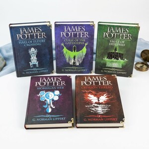 May include: A collection of five hardcover books titled James Potter by G. Norman Lippert. The titles include Hall of Elders Crossing, Curse of the Gatekeeper, Vault of Destinies, Morrigan Web, and Crimson Thread, each featuring unique cover art.