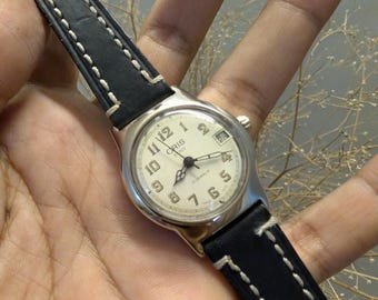 Oris Star de cuerda manual
