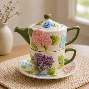 Juego de té individual de cerámica con diseño floral, tetera y taza apilables, exquisitas flores hechas a mano con relieve.