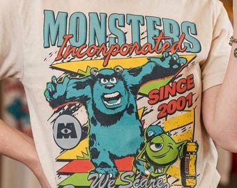 We Scare Because We Care Retro Monsters Inc Shirt, Sulley and Mike Graphic Tee, Vintage 2001 Pixar Cartoon Apparel, Disney Family Trip Top