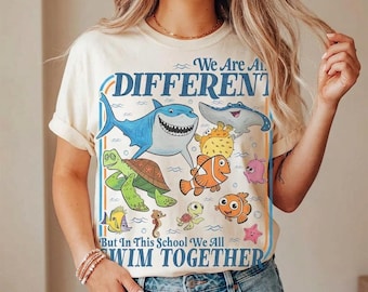We Are All Different But In This School We All Swim Together T-Shirt, Ocean Graphic Tee, Kindergarten Teacher Shirt, Cute Sea Creature Gift