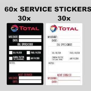 May include: A set of 60 Total brand service stickers, featuring 30 black and 30 white rectangular labels. Each sticker includes fields for mileage, date, oil spec, and checkboxes for oil, fuel, cabin, and air filters, plus a next service section.