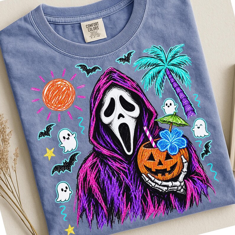 May include: A blue t-shirt featuring a graphic of a ghost-faced figure in a purple hooded robe holding a jack-o'-lantern with a tropical drink. The design includes a sun, palm tree, bats, stars, and small ghosts in a colorful, sketch-like style.