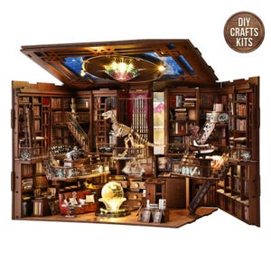May include: A detailed wooden DIY craft kit of a miniature library with a dinosaur skeleton, globe, and bookshelves. The kit includes a starry ceiling and a circular sign that says "DIY Crafts Kits".