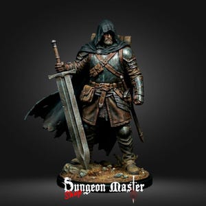May include: A detailed miniature figurine of a hooded warrior wearing weathered metal armour, a dark cloak, and leather straps. The figure holds a large broadsword in one hand and stands on a rocky base with the text Dungeon Master Shop printed below.