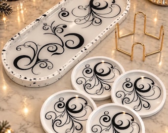 Handmade white oval eco resin  tray with  black swirling patterns  13x5.7x0.7 inch.Matching coasters optional