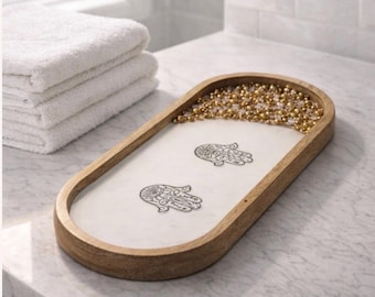 Handmade oval wood tray with silver hamsa accent 12x5x0.75 inch.