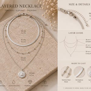 Op de afbeelding: Een zilverkleurige gelaagde ketting met een visgraatketting, een kralenketting en een zonhanger. De set bevat een verstelbare verlengketting van 5 cm. De lengtes zijn 36 cm, 41 cm en 50 cm, met een hanger van 1,8 cm in diameter.